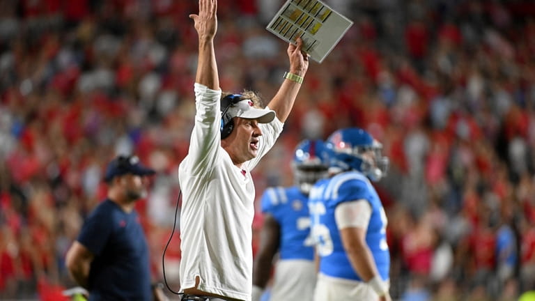 Mississippi head coach Lane Kiffin reacts during the second half...