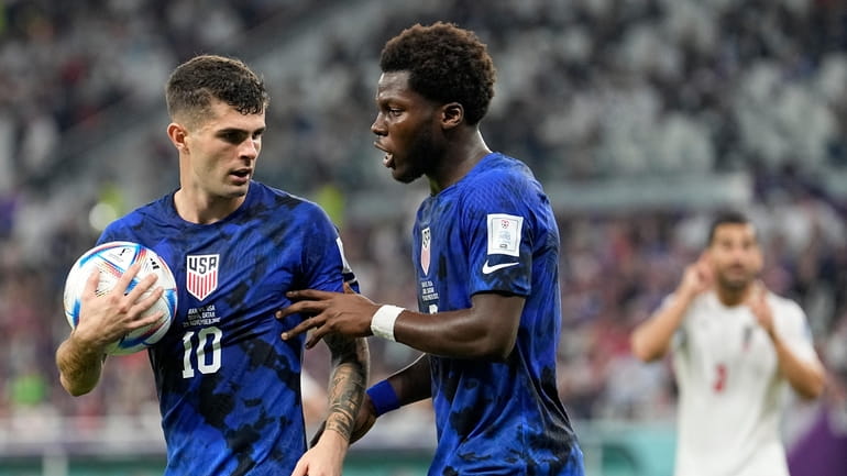 Christian Pulisic of the United States, left, and Yunus Musah...