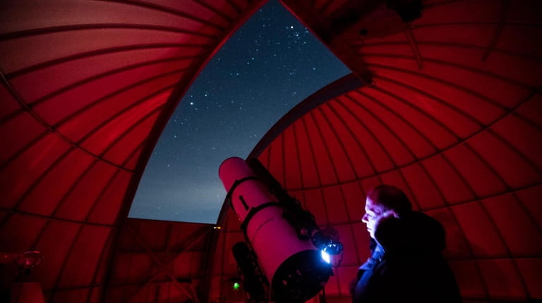 Chuck Cardona, president of the Custer Institute and Observatory in...