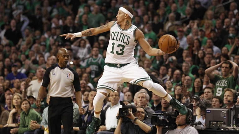 Boston's Delonte West saves the ball from a back court...
