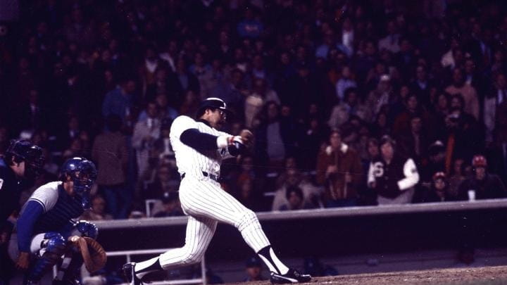 FILE - Reggie Jackson connects for his third home run...