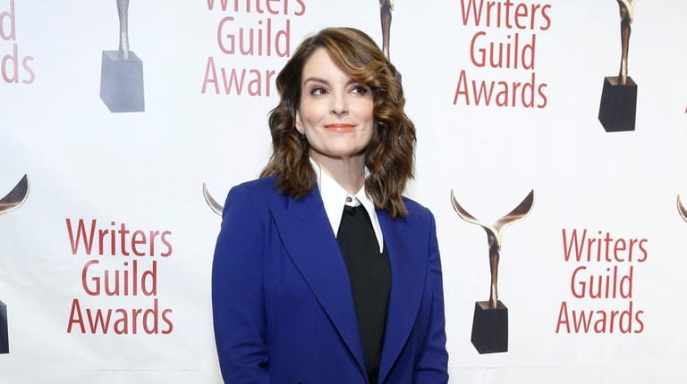 Tina Fey will co-host this year's "Golden Globes" with her...