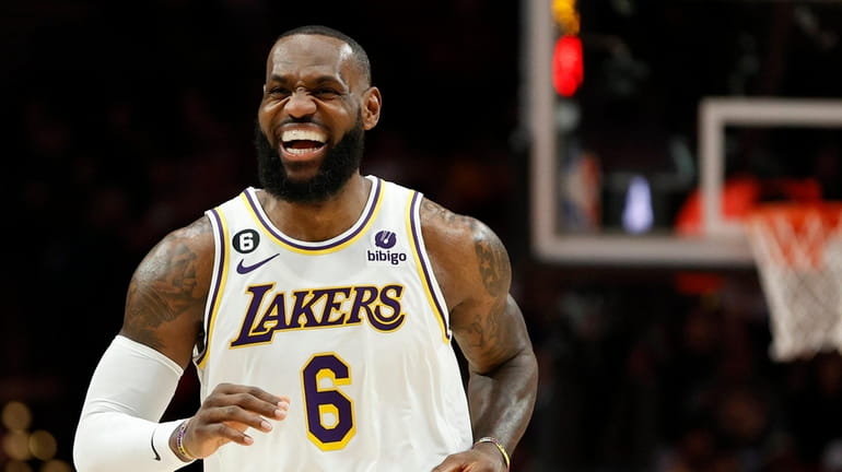 LeBron James #6 of the Los Angeles Lakers reacts against...