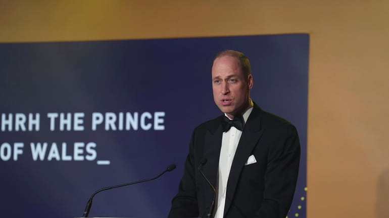 Britain's Prince William delivers a speech as he attends the...