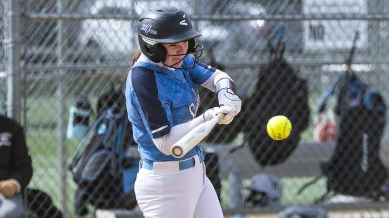 Caroline Ferchland #15 of Oceanside connects for a double and...