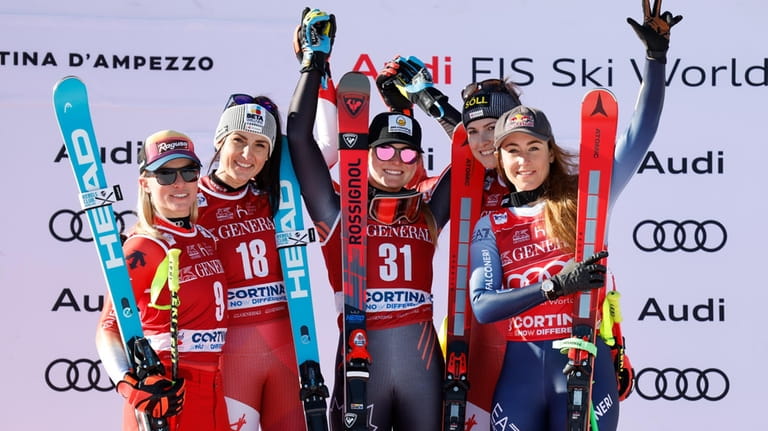 Austria's Stephanie Venier, second from left, winner of an alpine...