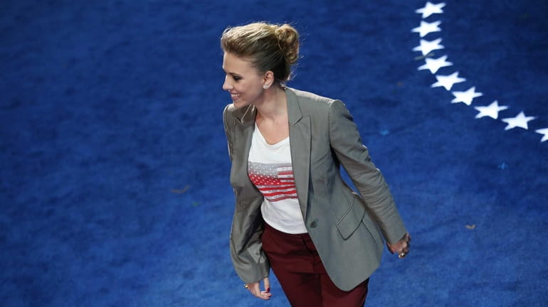 Actress Scarlett Johansson walks off stage during the final day...