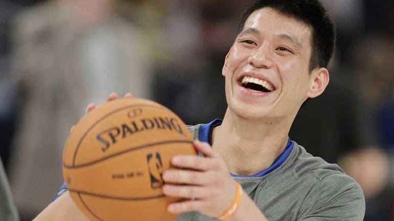 Knicks' Jeremy Lin laughs during warmups before the start of...
