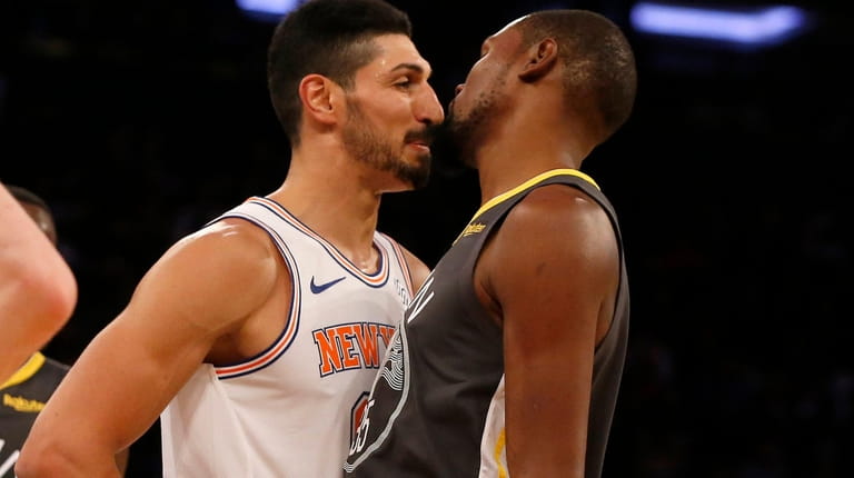 Enes Kanter, left, gets in Kevin Durant's face during the...