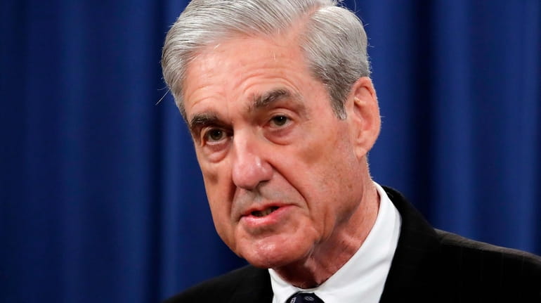 Special counsel Robert Mueller speaks at the Department of Justice...