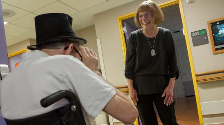 Care monitor Lois Byalick meets with a client at Gurwin...