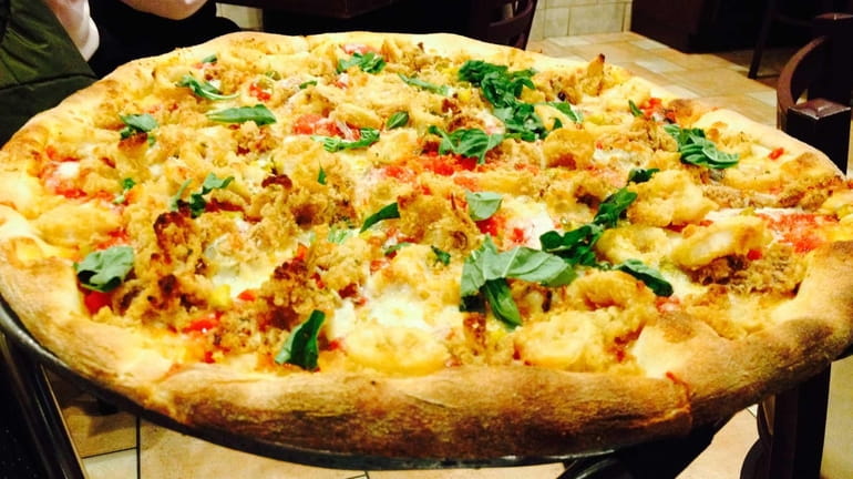 The "Palermo" pizza at Victor's in Melville includes fried calamari...
