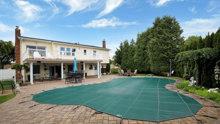 This three-bedroom waterfront home with pool in West Islip sold...