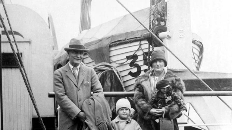 F. Scott Fitzgerald poses with wife Zelda and daughter Scottie...