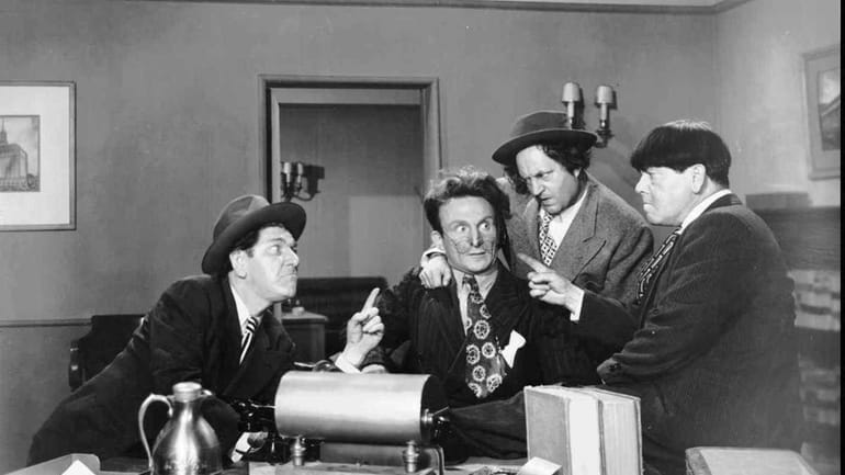 Emil Sitka, second from left, with the Three Stooges, from...