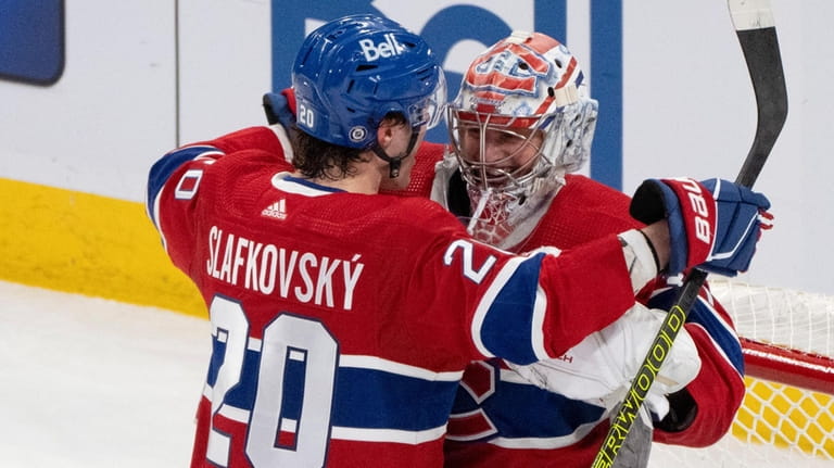 Montreal Canadiens goaltender Cayden Primeau (30) is congratulated on the...