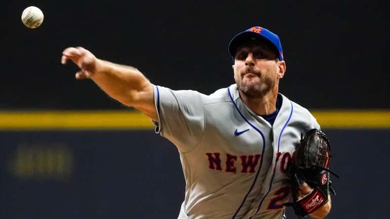 New York Mets starter Max Scherzer throws during the sixth...