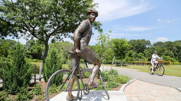 A statue of cyclist at the trailhead to the Jones...