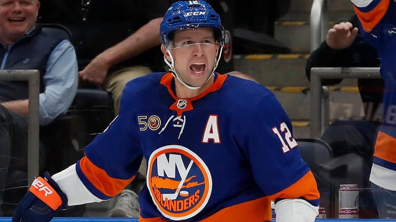 Josh Bailey of the New York Islanders celebrates his third-period goal...
