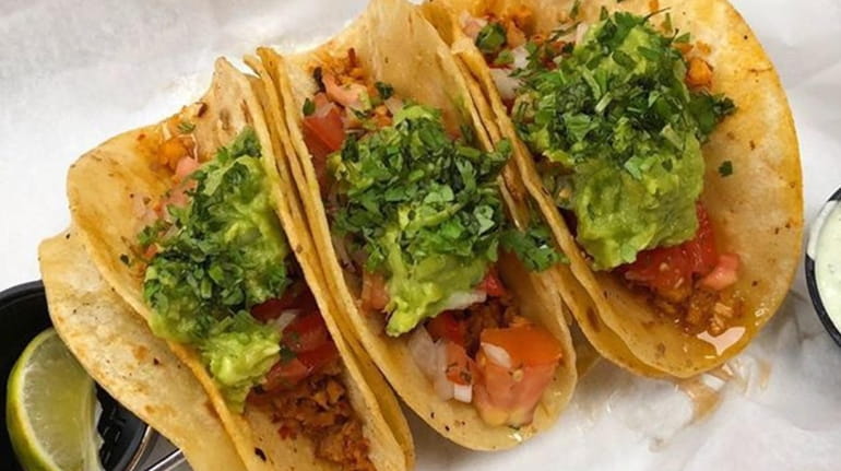 "Abuela" tacos at Curbside Mexican Grill are stuffed with shredded...