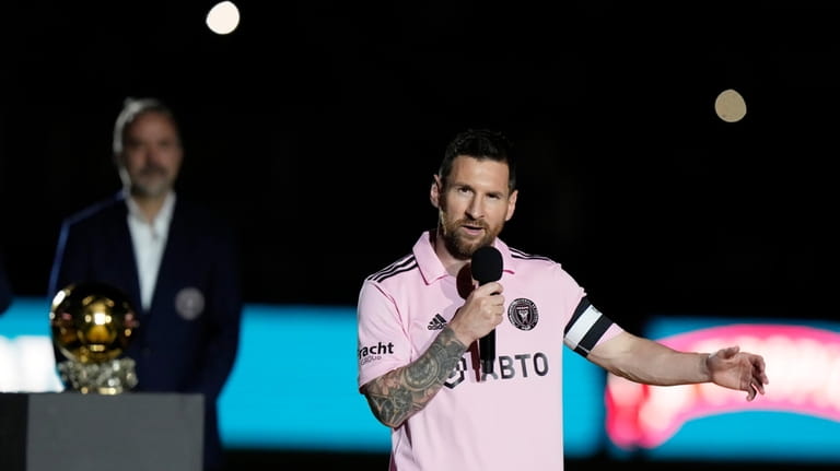 Inter Miami forward Lionel Messi speaks during a ceremony honoring...