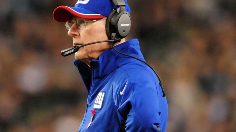 Giants head coach Tom Coughlin looks on during a game...