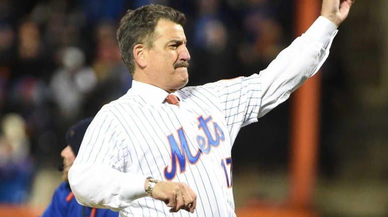 Mets great Keith Hernandez throws out the first pitch during...