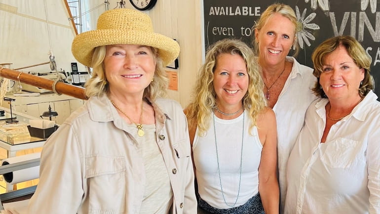 (Left to right) Martha Stewart with Southold residents and White...
