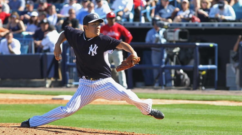 Masahiro Tanaka of the Yankees pitches against the Philadelphia Phillies...