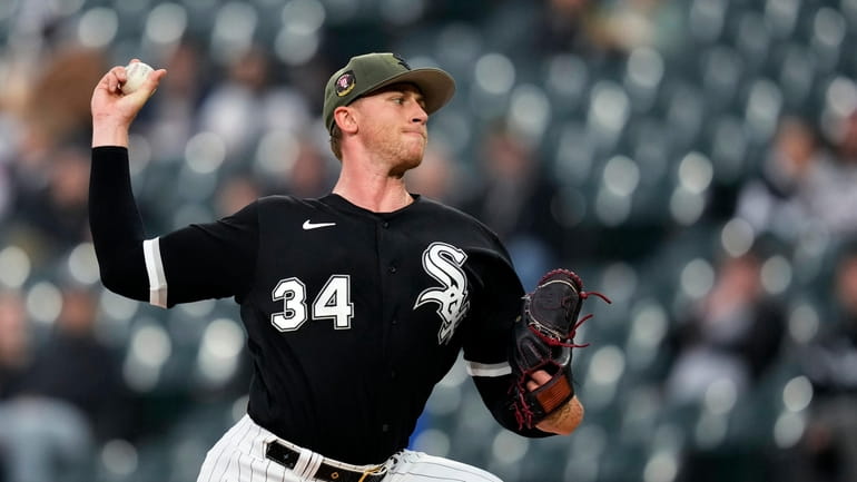Chicago White Sox starting pitcher Michael Kopech delivers during the...