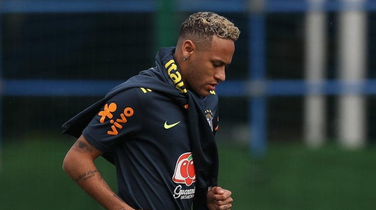 Neymar Jr runs during a training session at Yug-Sport Stadium...