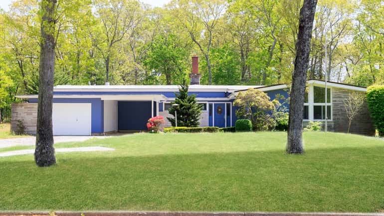 The 4,500-square-foot renovated home, built in 1954, has four bedrooms...