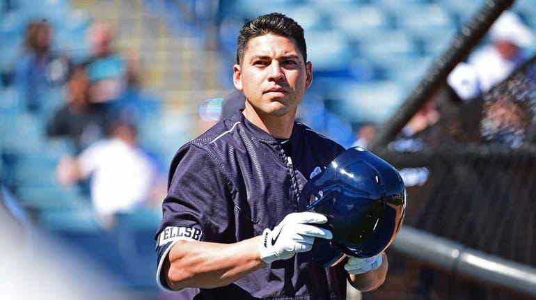Jacoby Ellsbury takes batting practice on the field during Spring...