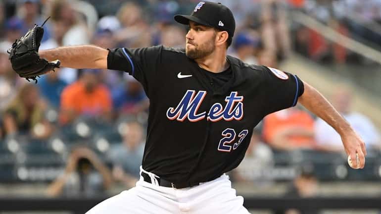 New York Mets starting pitcher David Peterson against the Texas...