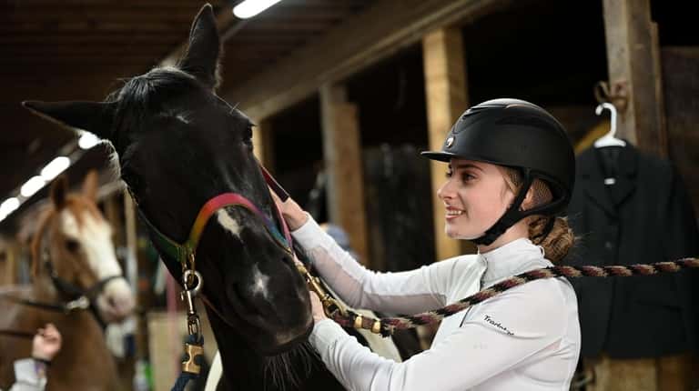 Whitney Hatzichristos, of Dix Hills, 14, who has been riding...