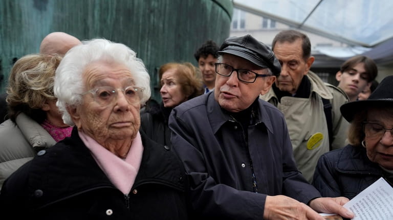 French nazi hunter Serge Klarsfeld, center right, and Auschwitz concentration...