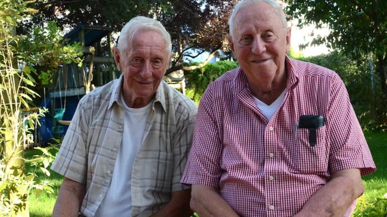From left, twins George and Lenny Motchkavitz, 85, recall what...