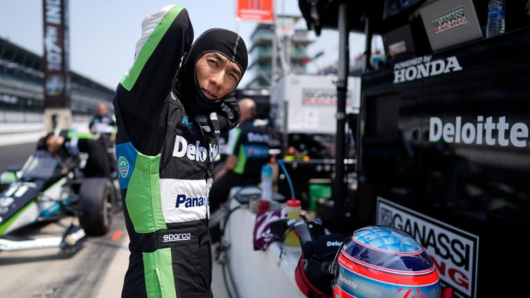 Takuma Sato, of Japan, prepares to drive during practice for...