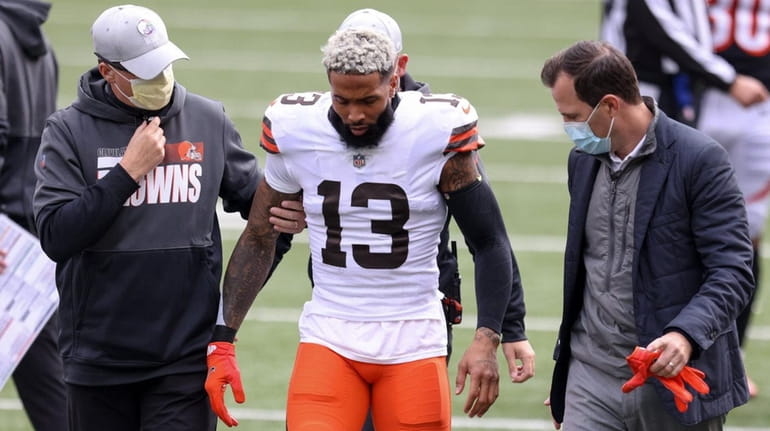 Odell Beckham Jr. of the Browns walks off the field in...