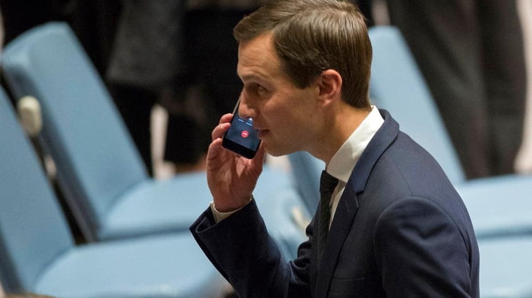 Jared Kushner takes a phone call before a Security Council...