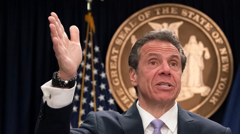 Gov. Andrew M. Cuomo responds to reporters questions about overtime abuse...