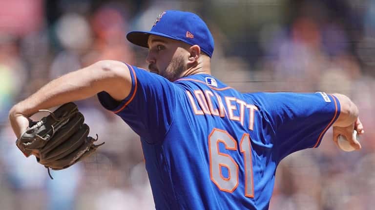 Walker Lockett #61 of the Mets pitches against the San Francisco...