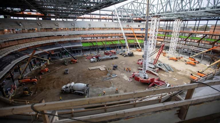 Work continues on the seating bowl inside UBS Arena at...
