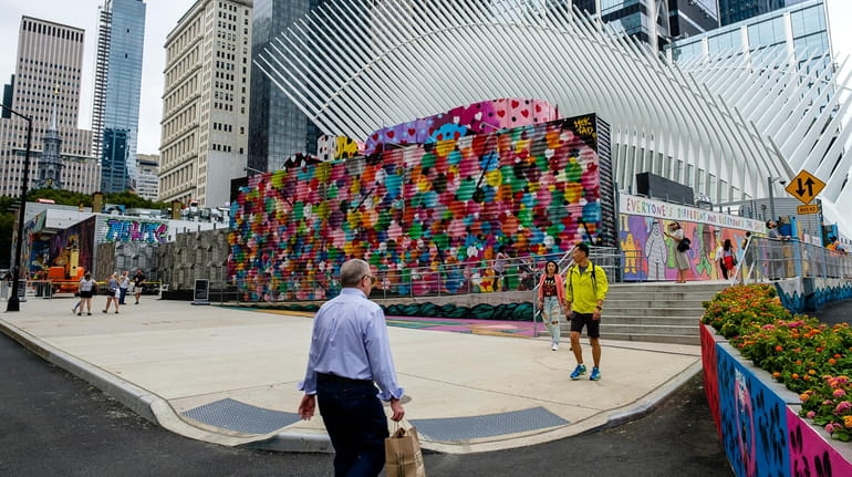 Colorful artwork covers the exterior of the site on Friday...