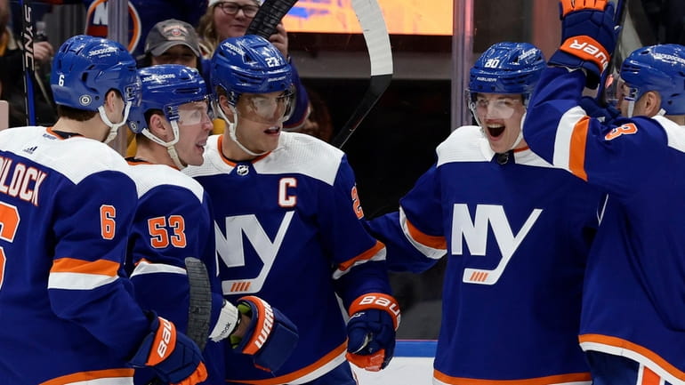 Anders Lee #27 of the Islanders celebrates his first goal of...