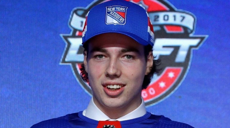Filip Chytil poses for photos after being selected 21st overall...