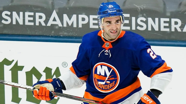 The Islanders' Kyle Palmieri smiles after scoring a goal during...
