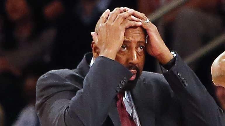 Mike Woodson reacts to a foul call during the game...