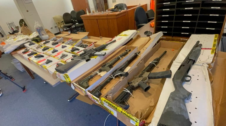 A catche of weapons is on display as the Nassau County...