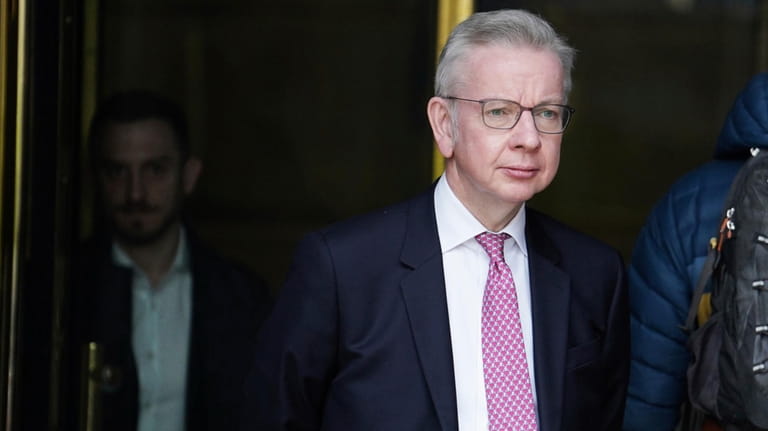 Britain's Minister for Levelling Up, Housing and Communities, Michael Gove,...